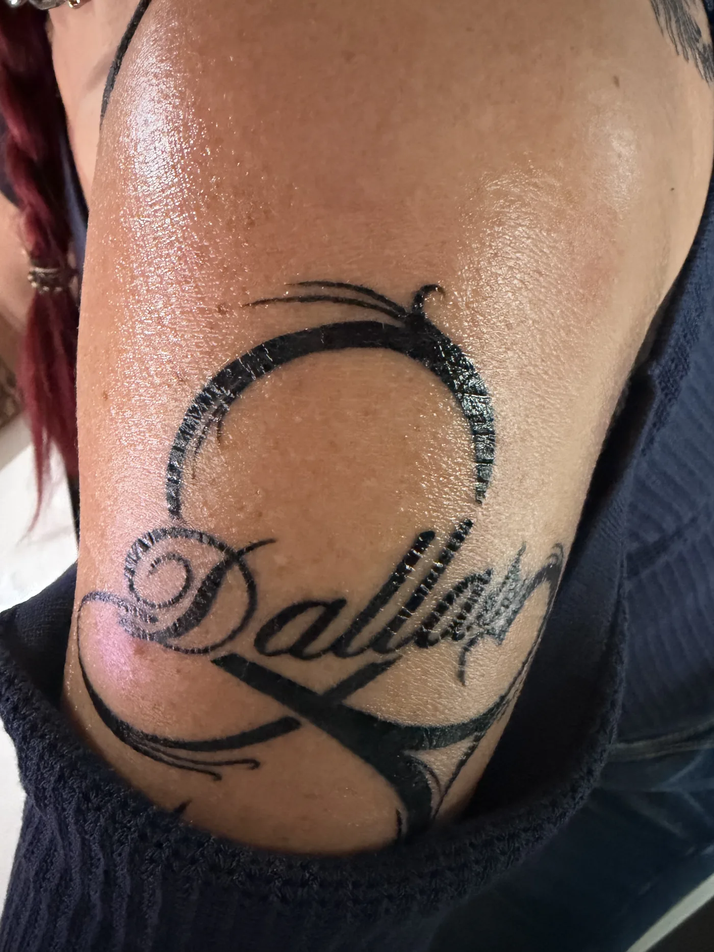 Dallas. Inked in script. — I wear the line.