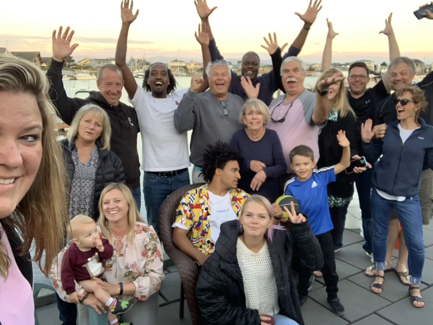 Our family. Hands up. — Kevin and Linda Bagley. Kevin’s brother Curt and his wife Sandy. My husband Michael in the middle. Torel, Liz, and Allula. And the rest of our family. — The year before my father died. The line runs through all of us.