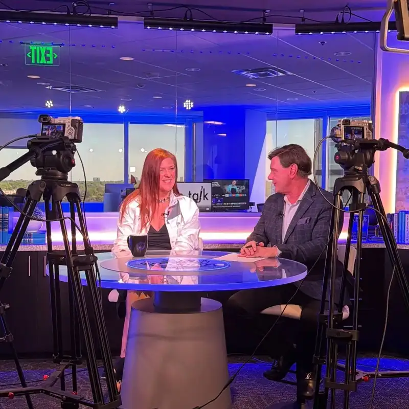 Jennifer Bagley interviewed on Tip Talk in a broadcast studio