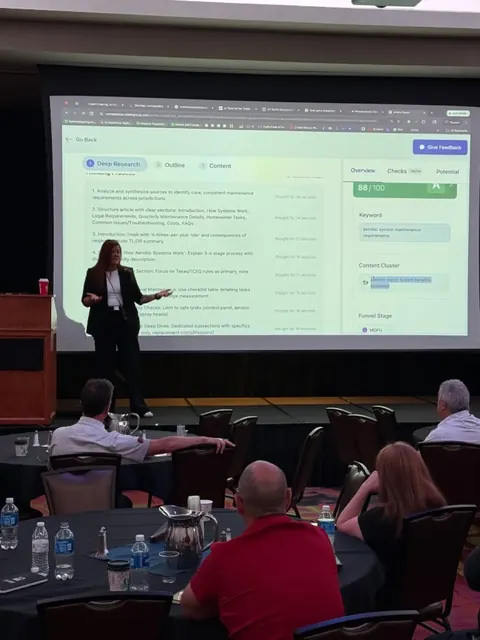 Jennifer demonstrating a live Cortex AI build on stage — scored 88/100 in real time